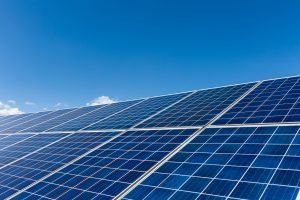 solar panels against a blue sky