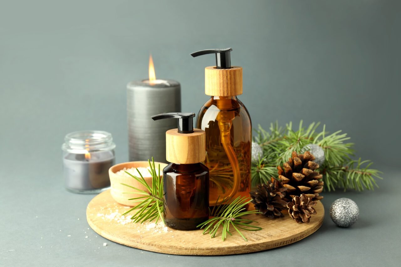 Composition with winter cosmetic products on light gray background