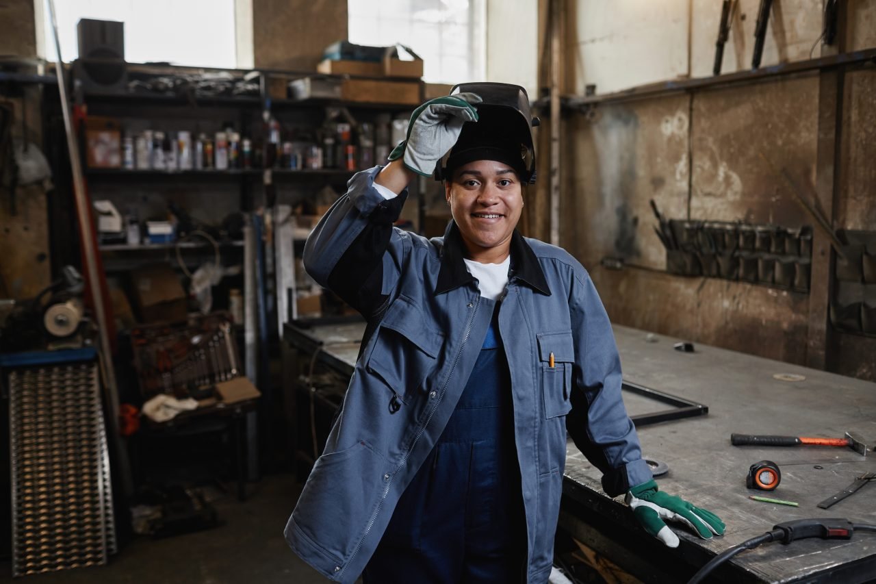 Portrait Of Female Welder In Workshop